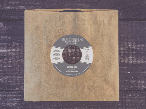 Ikebe Shakedown: Curitiba Strut / Monophonics / Hanging On - 7-INCH SINGLE