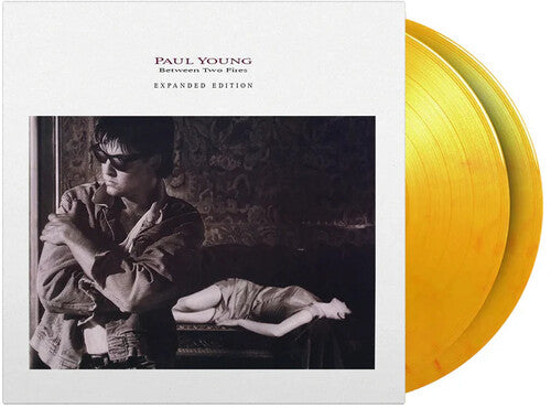 Paul Young: Between Two Fires - Limited & Expanded 180-Gram Flame Colored Vinyl - VINYL LP